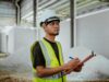 construction audit importance in project success with site inspection and blueprint