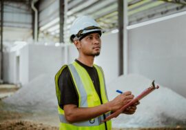 construction audit importance in project success with site inspection and blueprint