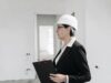 Project manager conducting construction audit checklist on commercial building site