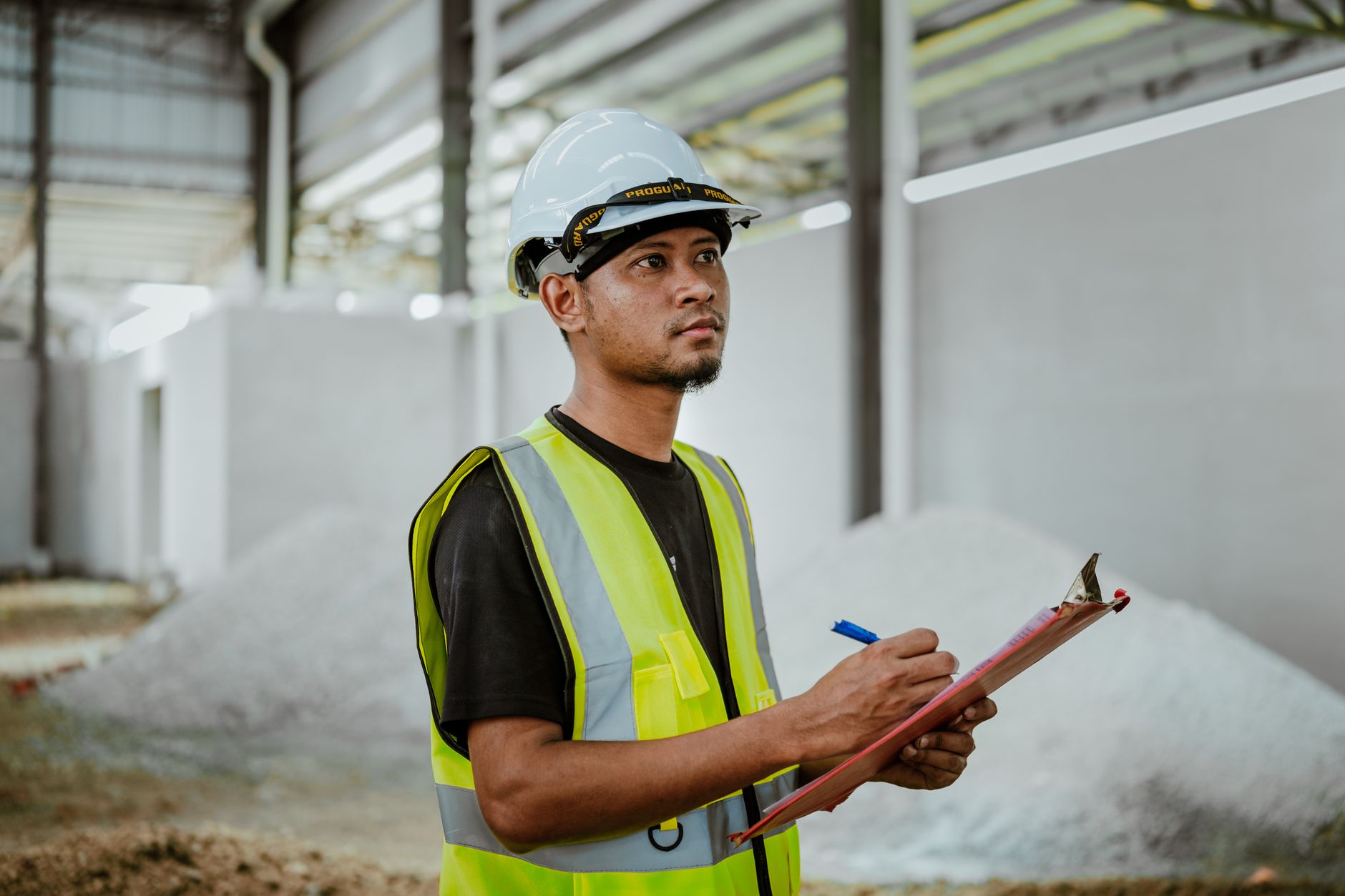 construction audit importance in project success with site inspection and blueprint