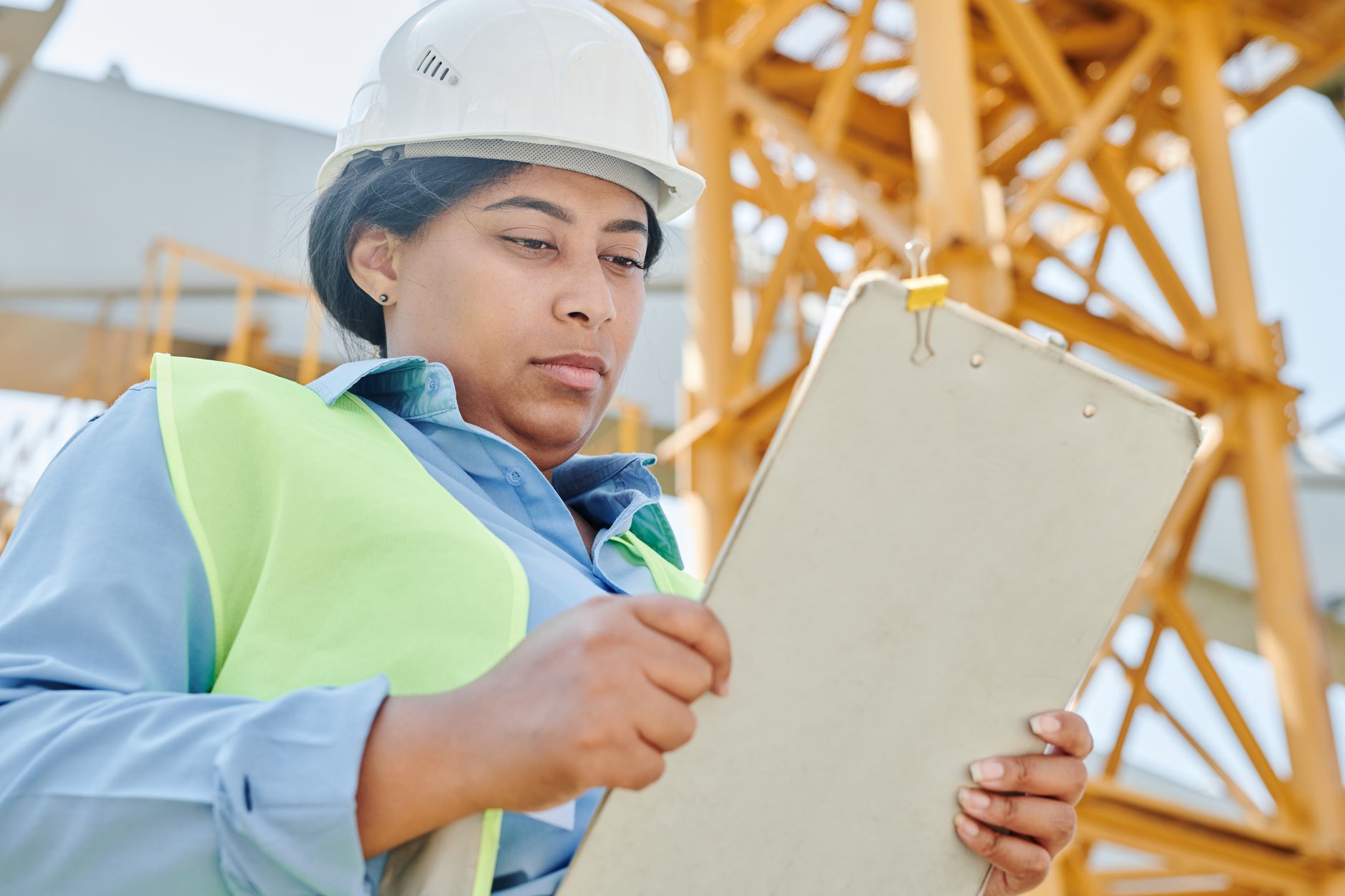 Operational control in construction project management with site inspection and blueprint review