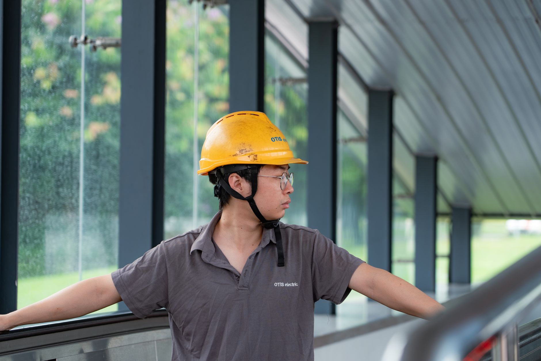 construction audit at commercial construction site with project manager reviewing blueprints