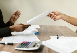 Project manager conducting contract negotiation for corporate office fitouts