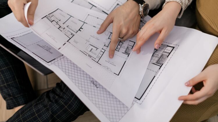 Project manager reviewing cost estimation for corporate office fitout planning