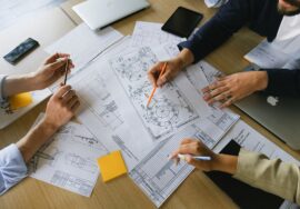 Project manager conducting cost tracking for corporate office fitout budget control