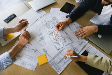 Project manager conducting cost tracking for corporate office fitout budget control