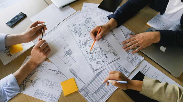 Project manager conducting cost tracking for corporate office fitout budget control