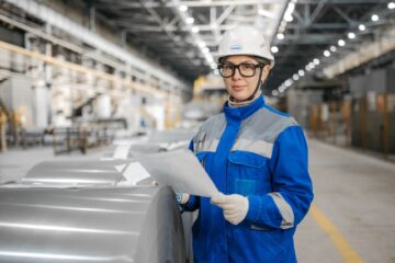 Corporate office construction site showing project manager reviewing fitout compliance checklist