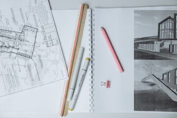 Construction project manager using progress tracking tools during corporate office fitout