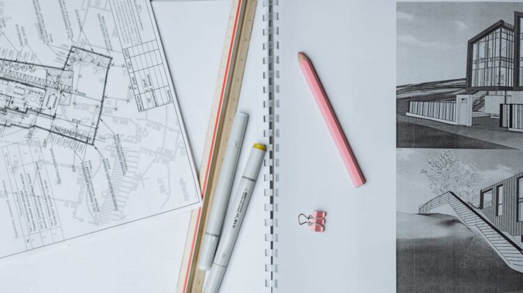 Construction project manager using progress tracking tools during corporate office fitout
