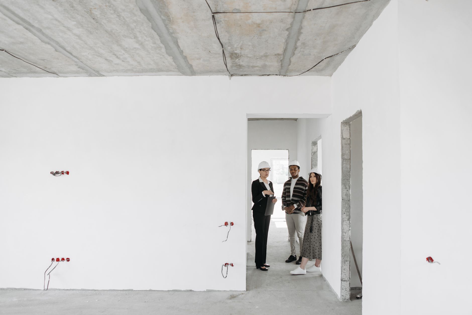 Corporate office interiors fitout with project manager reviewing office interiors plans