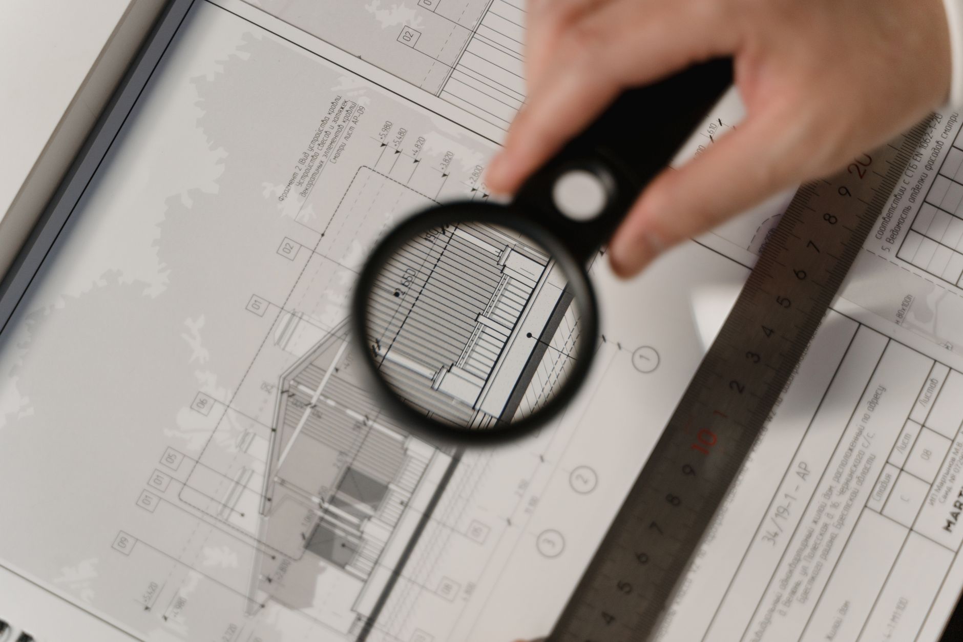 Project execution at a corporate office fitout site with project manager reviewing plans
