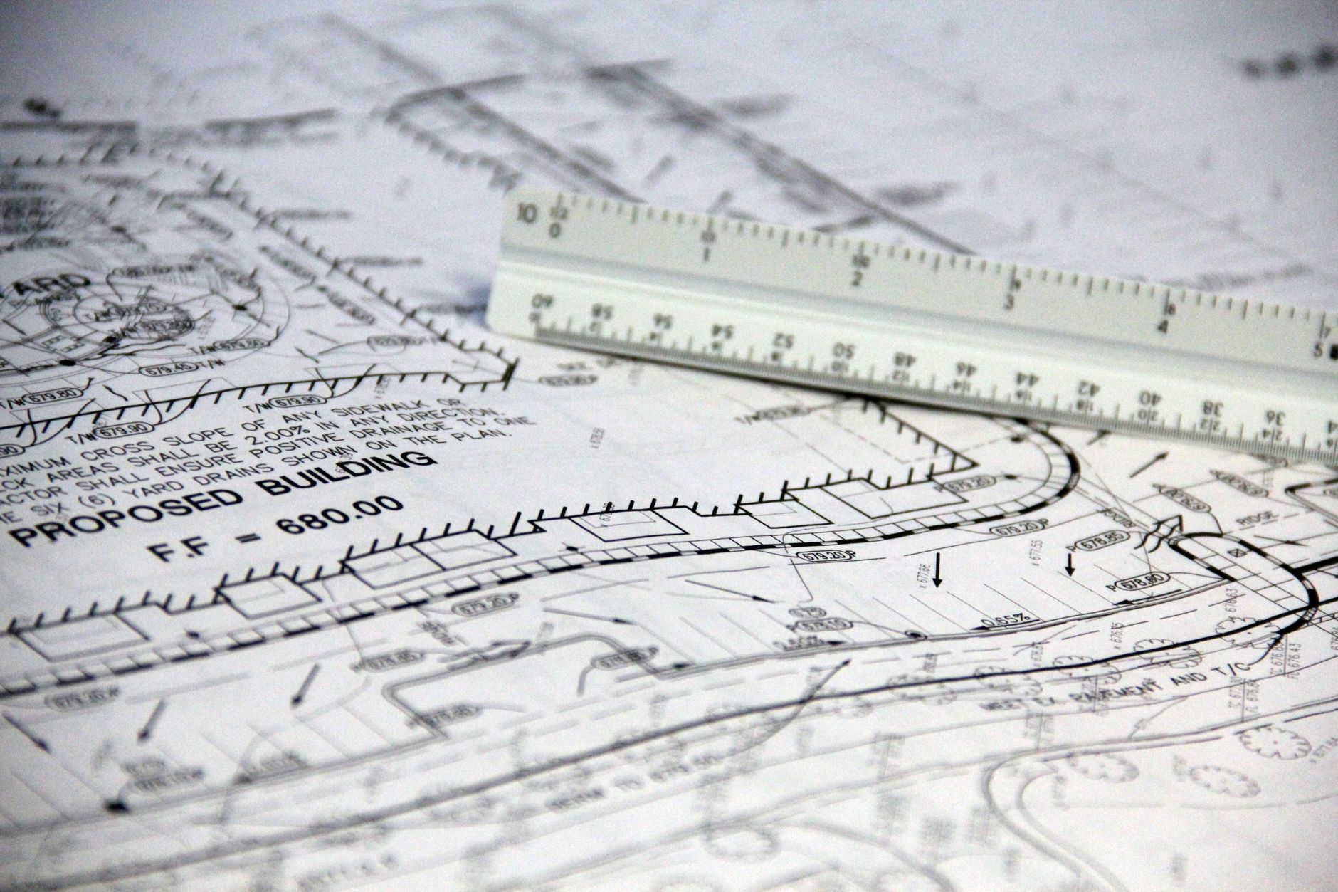 Project manager reviewing technical feasibility assessment for corporate office fitout