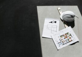 Project manager reviewing workspace design layout during office fitout project planning