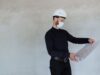 construction project manager reviewing delivery planning for construction project timelines