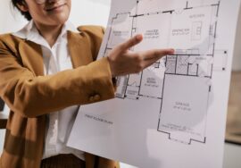 construction project manager discussing project milestones on site