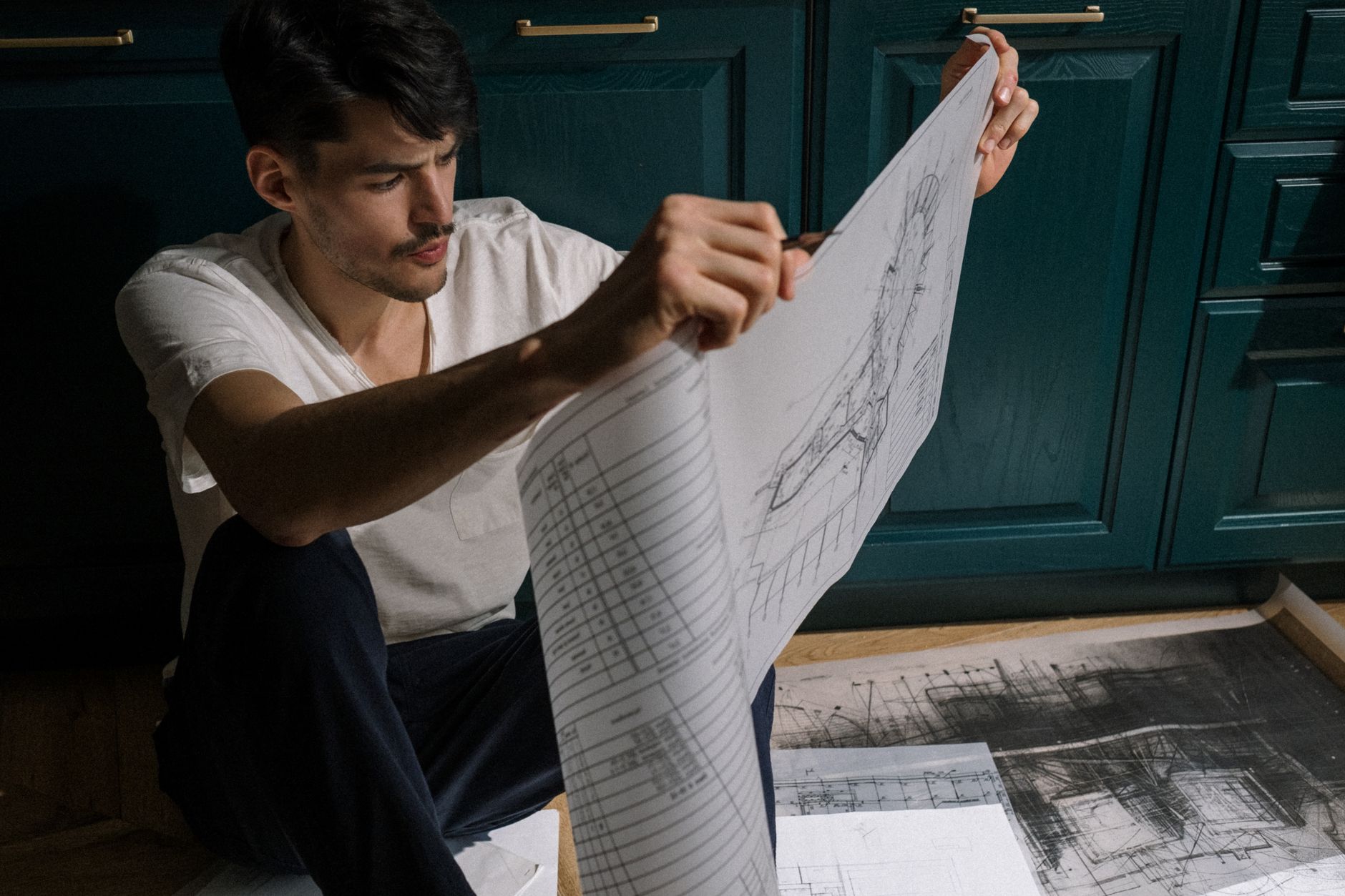 Construction project manager reviewing execution planning at site