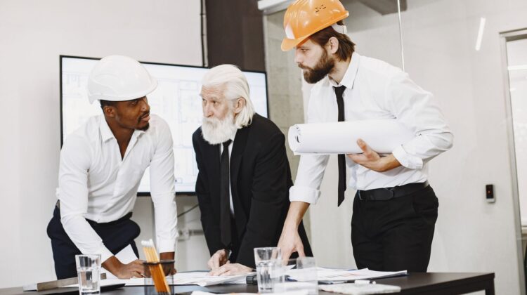 construction project manager conducting risk planning on site