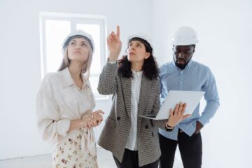 Construction project manager applying value engineering during construction planning and cost control