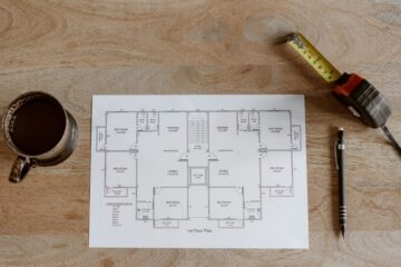 Construction project manager reviewing work breakdown for planning accuracy