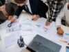 construction project manager using budget forecasting for construction strategy planning