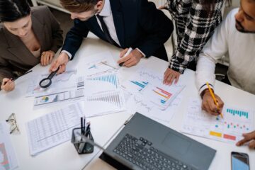 construction project manager using budget forecasting for construction strategy planning