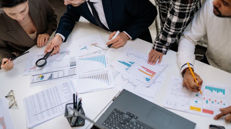 construction project manager using budget forecasting for construction strategy planning