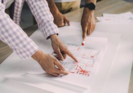 Construction project manager overseeing design integration in construction project planning