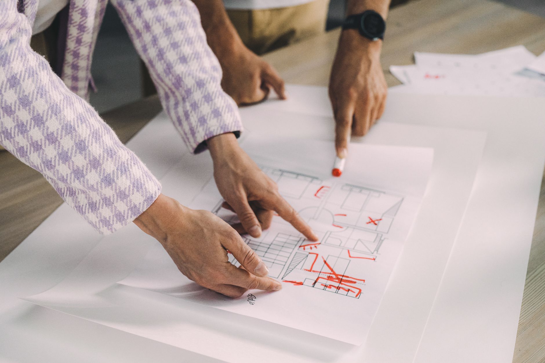 Construction project manager overseeing design integration in construction project planning