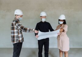 Construction site with project manager conducting constructability review