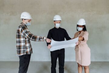 Construction site with project manager conducting constructability review