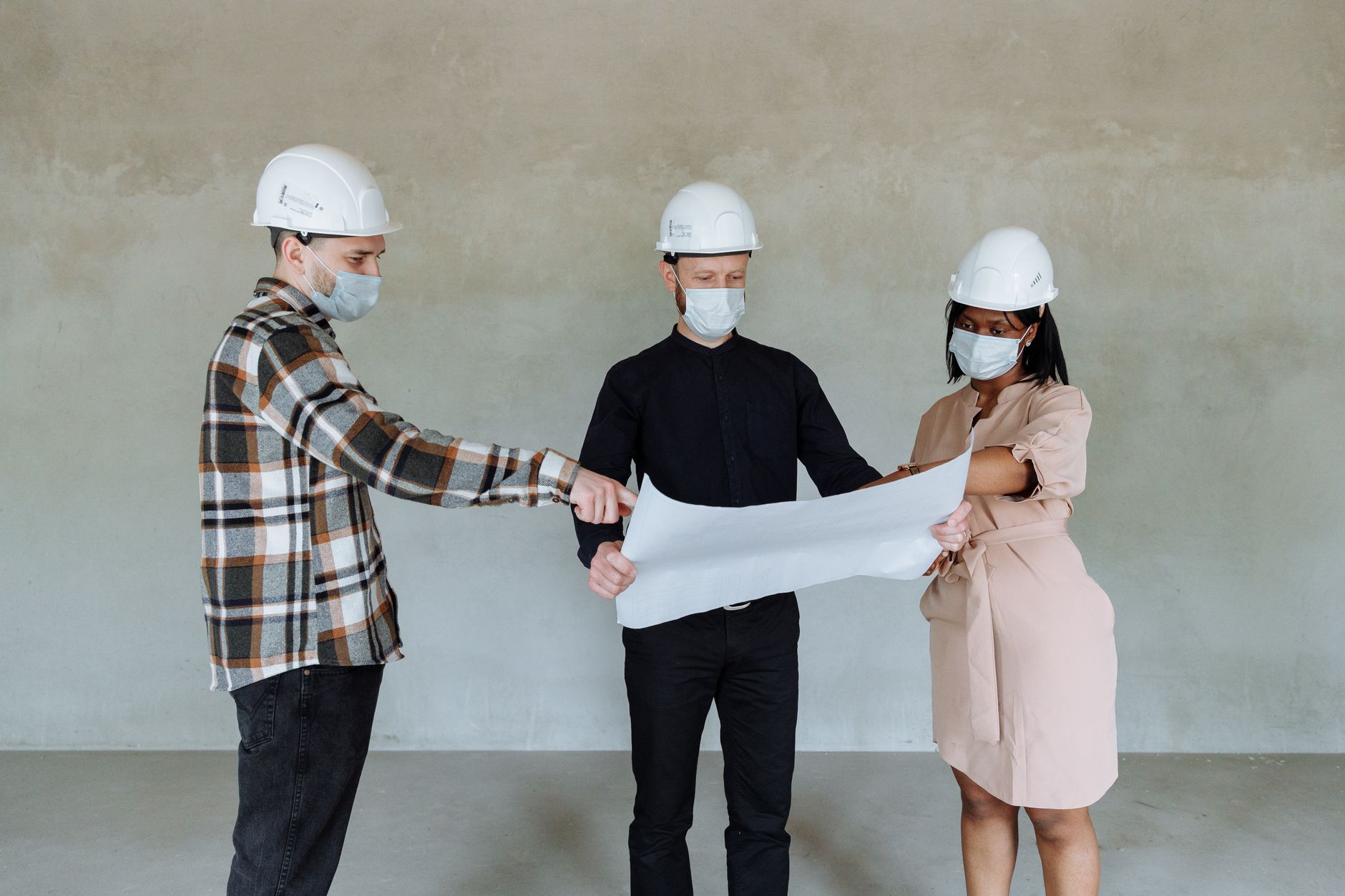 Construction site with project manager conducting constructability review
