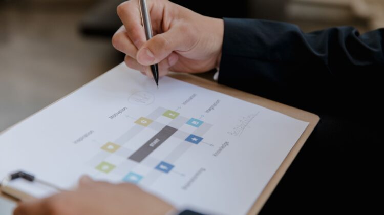 Construction project manager reviewing schedule baseline for commercial building